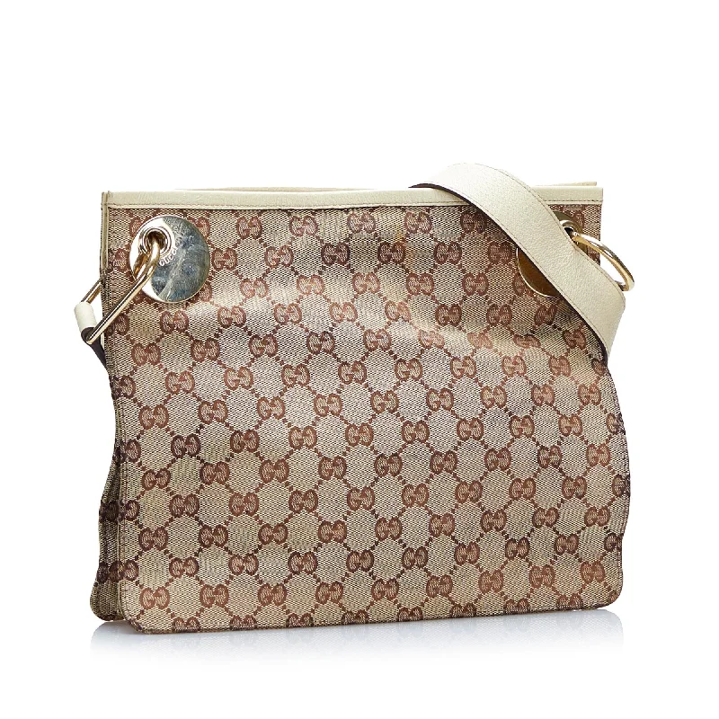 Women Gucci bags with a chain - link trim and a leather bodyGucci GG Canvas Eclipse Crossbody (SHG-DNx87B)