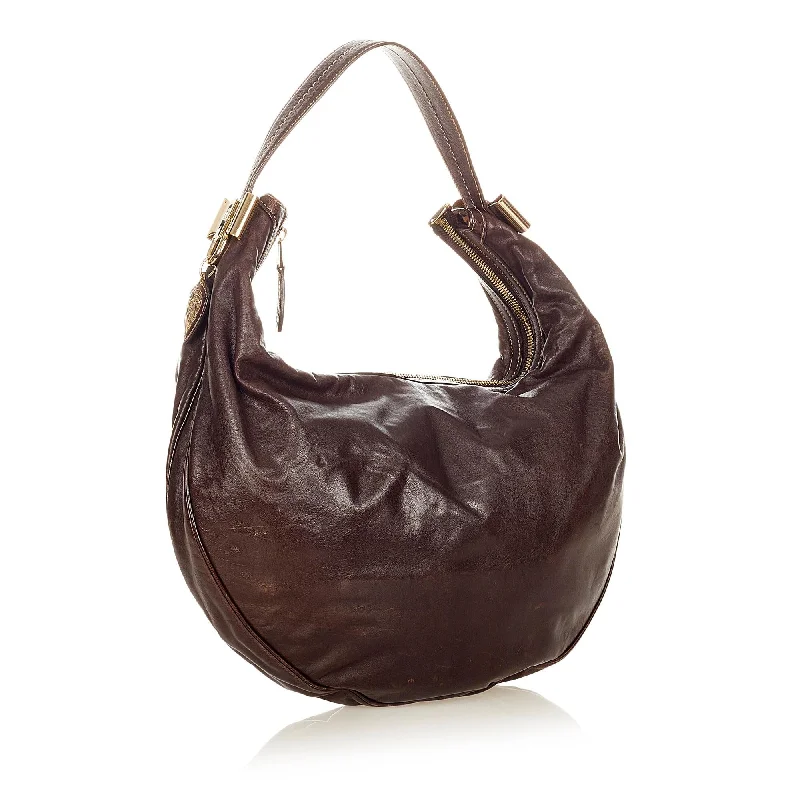 Ladies Gucci shoulder bags with a tassel decorationGucci Duchessa Leather Hobo Bag (31851)