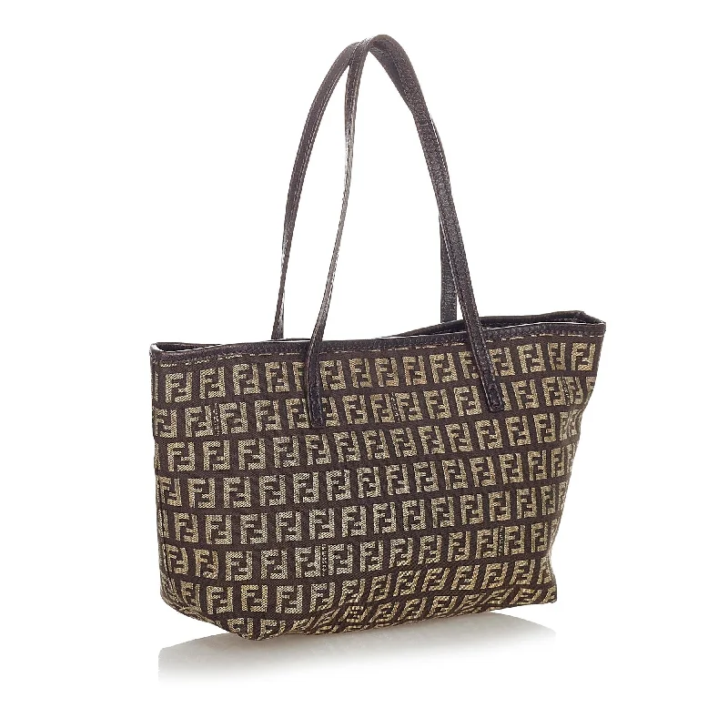 Fendi tote bags with a snap - button closure and a decorative charm for a fashionable and personalized lookFendi Zucchino Canvas Tote Bag (SHG-23843)