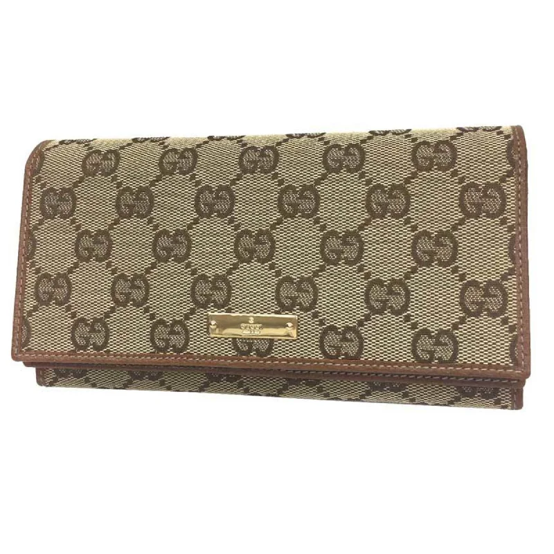 Women Gucci Sylvie bags with a detachable ribbon detailGucci GG canvas W flap bifold long wallet 131888 leather beige