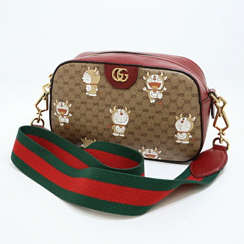 Ladies Gucci shoulder bags with a tassel decorationGucci??DORAEMON Doraemon GG Supreme Shoulder Bag 574886 Beige Red