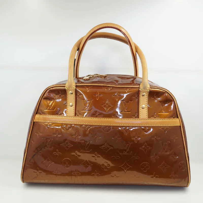 Louis Vuitton handbags with a patent - leather finish for a shiny lookLouis Vuitton Tompkins