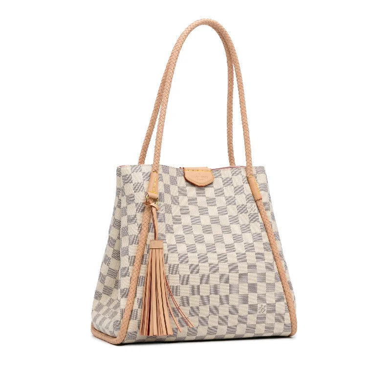 Louis Vuitton Alma bags featuring the signature top - handle designWhite Louis Vuitton Damier Azur Propriano Tote Bag