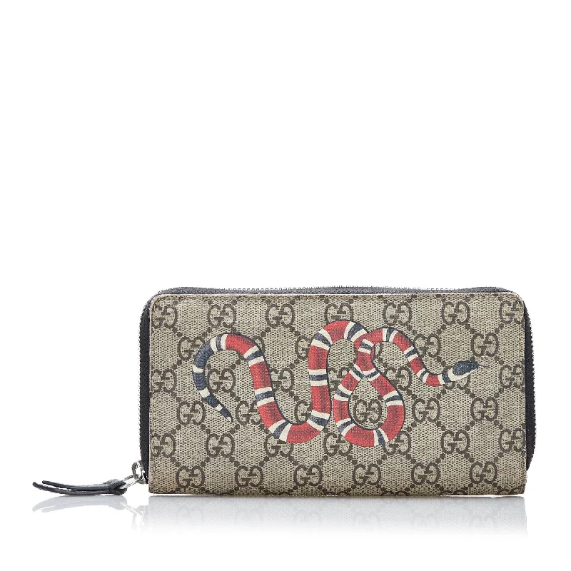 Women Gucci Sylvie bags with a monogram - embossed leatherGucci GG Supreme Kingsnake Zip Around Wallet Long Wallets