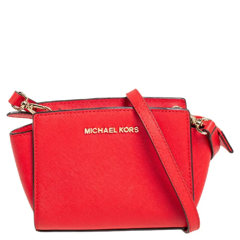 quilted Michael Michael Kors shoulder bags for a textured appearanceOrange Saffiano Leather Mini Selma Crossbody Bag