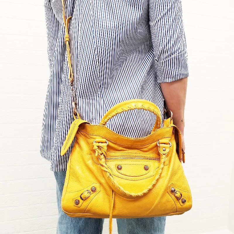 Vegan leather handbagsBALENCIAGA MUSTARD CITY BAG