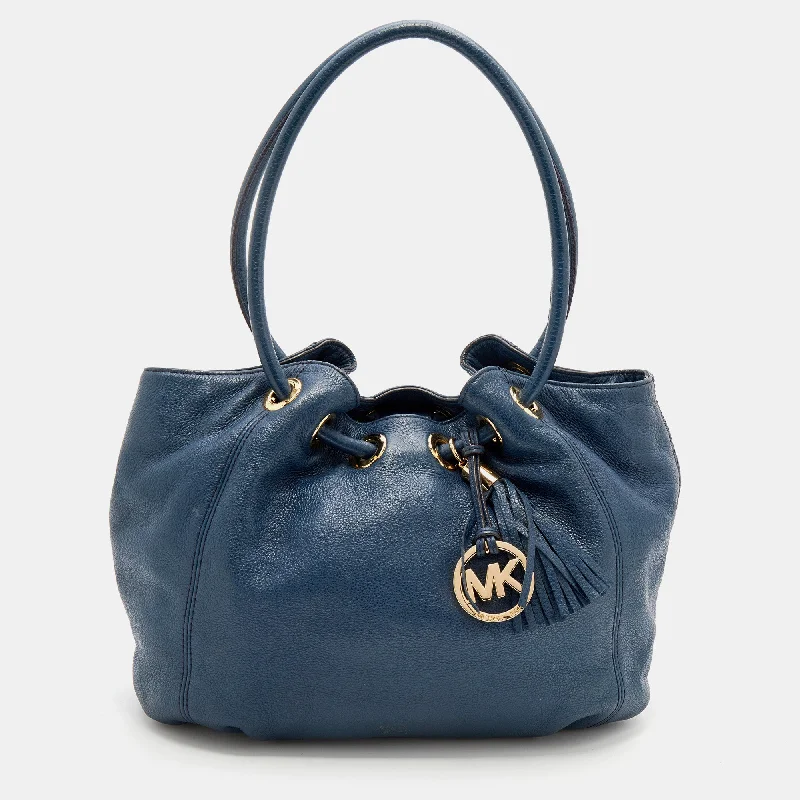 Michael Michael Kors Bags for cruise vacations with a nautical - inspired lookBlue Leather Ring Tassel Tote