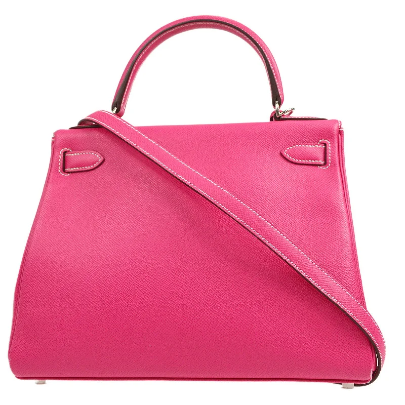 Hermès Kelly Bags with a decorative tassel charmHERMES * 2011 KELLY 28 RETOURNE Rose Tyrien Epsom