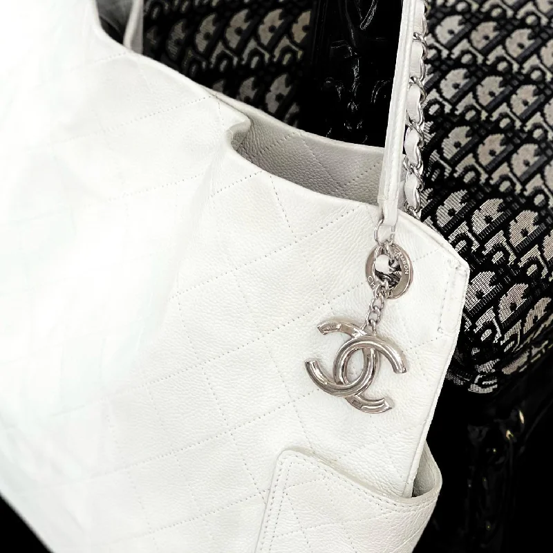 Chanel bags with leather and tweed combinationsCHANEL CAVIAR QUILTED LEATHER TOTE BAG