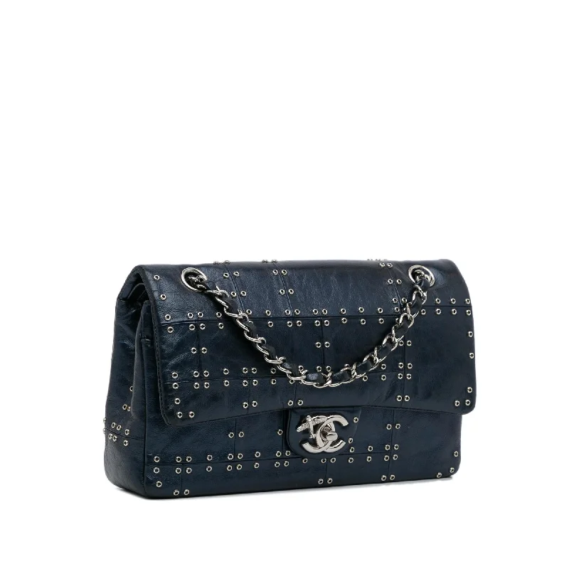 Chanel bags with exclusive seasonal designs and materialsChanel Medium Studded Leather Airlines Double Flap (MHpqyU)