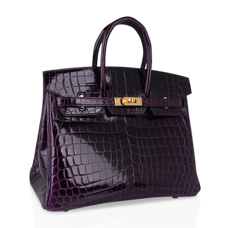 Hermes Birkin Bags with a Hand - Carved Leather DecorationHermes Birkin 25 Bag Aubergine Niloticus Crocodile with Gold Hardware